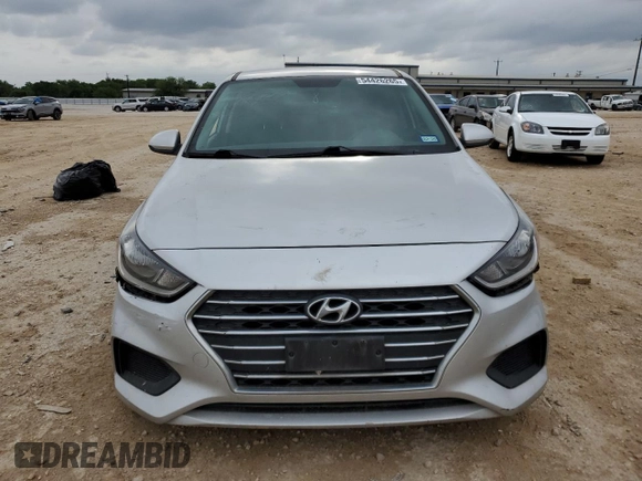 2021 Hyundai Accent SE с VIN 3KPC24A63ME131888, выставлен на аукционе Copart как лот 54426265 с пробегом 124 523 миль миль и Списание • Salvage title. История ставок и продаж доступна на DreamBid. Изображение 5.