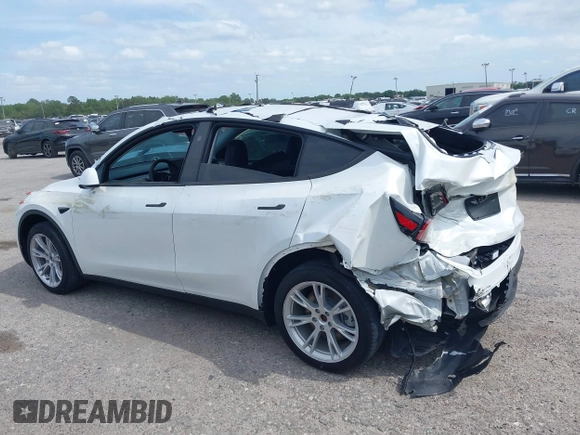 2023 Tesla Model Y Long Range with VIN 7SAYGDEE3PA206757, listed as a IAAI auction lot 39425483 with 5,711 mi miles and . Bid and sale history available at DreamBid. Image 14.