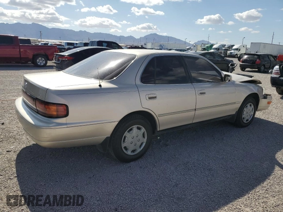 1993 Toyota Camry LE z VIN 4T1SK12E7PU287093, wystawiony jako Copart lot #55682275 z przebiegiem 110 399 mil mil oraz Szkoda całkowita • Salvage title. Historia ofert i sprzedaży dostępna na DreamBid. Obrazek 3.