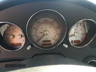 2004 Mercedes-Benz SLK-Class with VIN WDBKK65F74F304950, listed as a Copart auction lot 46674125 with 91,574 mi miles and Salvage Title. Bid and sale history available at carsss.com. Image 9.