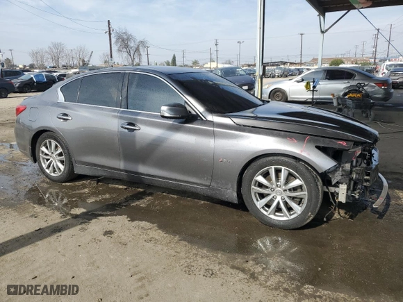 2015 Infiniti Q50 with VIN JN1BV7AP0FM334595, listed as a Copart auction lot 43240365 with 122,553 mi miles and Salvage Title. Bid and sale history available at carsss.com. Image 4.