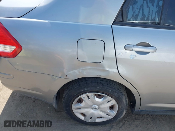 2011 Nissan Versa S with VIN 3N1BC1AP0BL393704, listed as a IAAI auction lot 42334003 with 164,394 mi miles and . Bid and sale history available at DreamBid. Image 12.