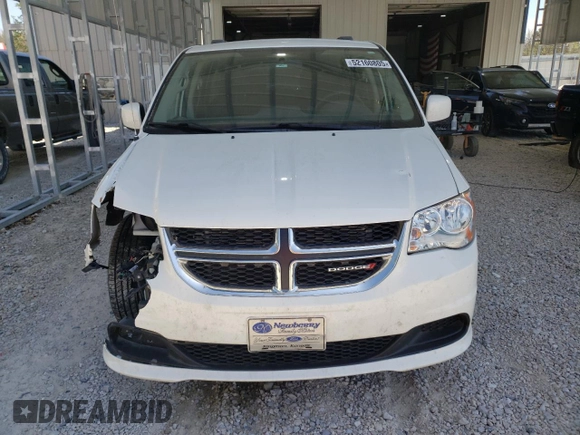 2013 Dodge Grand Caravan SXT with VIN 2C4RDGCG5DR554126, listed as a Copart auction lot 52160805 with 201,161 mi miles and Salvage Title. Bid and sale history available at DreamBid. Image 5.