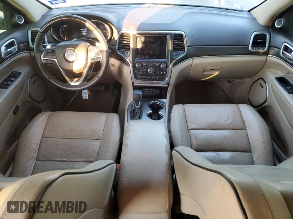2018 Jeep Grand Cherokee Overland with VIN 1C4RJFCT3JC453784, listed as a Copart auction lot 71921944 with 56,097 mi miles and Salvage title. Bid and sale history available at DreamBid. Image 8.