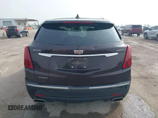 2021 Cadillac XT5 FWD Luxury with VIN 1GYKNAR44MZ184070, listed as a IAAI auction lot 41934265 with 60,596 mi miles and . Bid and sale history available at DreamBid. Image 16.