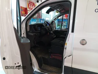 2021 Ford Transit Cargo with VIN 1FTBR2YG2MKA51800, listed as a IAAI auction lot 42793917 with 61,733 mi miles and . Bid and sale history available at DreamBid. Image 11.