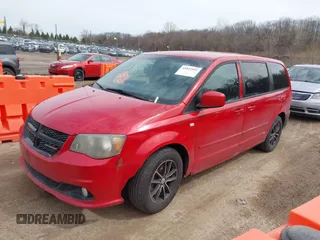 2014 Dodge Grand Caravan SXT with VIN 2C4RDGCG1ER371386, listed as a IAAI auction lot 41822952 with 228,052 mi miles and . Bid and sale history available at DreamBid. Image 2.