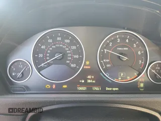 2015 BMW 3 Series 328i xDrive with VIN WBA3B3C59FJ985091, listed as a Copart auction lot 57658705 with 106,521 mi miles and Salvage title. Bid and sale history available at DreamBid. Image 9.