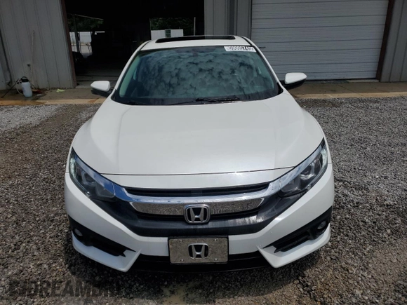 2017 Honda Civic EX-L z VIN 19XFC1F74HE014241, wystawiony jako Copart lot #59005745 z przebiegiem 55 629 mil mil oraz Czysty tytuł • Clean title. Historia ofert i sprzedaży dostępna na DreamBid. Obrazek 5.