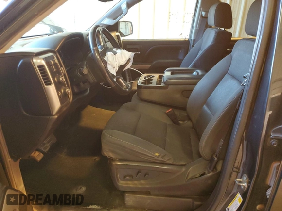 2018 Chevrolet Silverado 1500 LT with VIN 3GCUKRECXJG283331, listed as a Copart auction lot 52102345 with 69,603 mi miles and Salvage Title. Bid and sale history available at DreamBid. Image 7.
