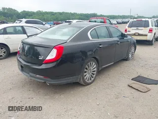 2013 Lincoln MKS z VIN 1LNHL9EK0DG600129, wystawiony jako IAAI lot #42314913 z przebiegiem 119 674 mil mil oraz . Historia ofert i sprzedaży dostępna na DreamBid. Obrazek 4.