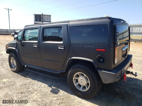 2005 Hummer H2 SUV with VIN 5GRGN23U65H108432, listed as a Copart auction lot 76786844 with 248,780 mi miles and Salvage Title. Bid and sale history available at carsss.com. Image 2.