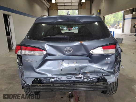 2024 Toyota Corolla Cross LE z VIN 7MUBAABG7RV106693, wystawiony jako Copart lot #53959255 z przebiegiem 25 874 mil mil oraz Szkoda całkowita • Salvage title. Historia ofert i sprzedaży dostępna na DreamBid. Obrazek 6.