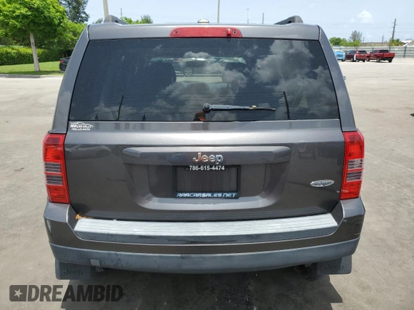 2014 Jeep Patriot High Altitude with VIN 1C4NJPFA2ED888925, listed as a Copart auction lot 60191435 with 122,308 mi miles and Salvage title. Bid and sale history available at DreamBid. Image 6.
