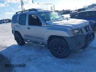2011 Nissan Xterra S z VIN 5N1AN0NWXBC521422, wystawiony jako IAAI lot #41333536 z przebiegiem 147 014 mil mil oraz . Historia ofert i sprzedaży dostępna na DreamBid. Obrazek 1.
