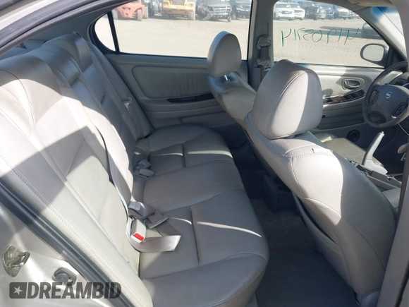 2003 Nissan Maxima GLE z VIN JN1DA31A83T411224, wystawiony jako IAAI lot #41905714 z przebiegiem Nie podano mil oraz . Historia ofert i sprzedaży dostępna na DreamBid. Obrazek 8.