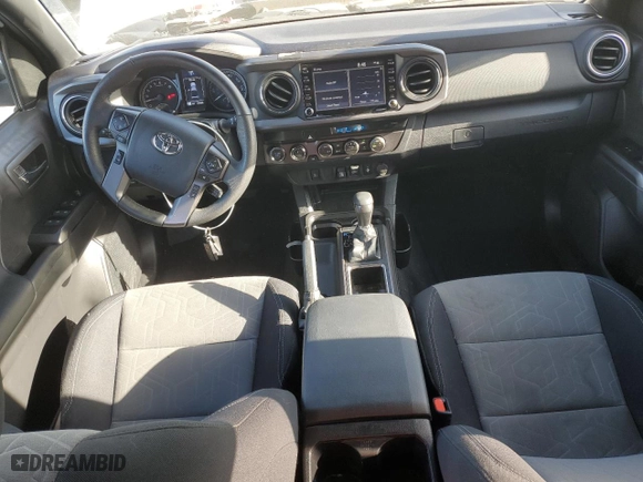 2023 Toyota Tacoma 4WD SR with VIN 3TMCZ5AN9PM638538, listed as a Copart auction lot 53910225 with 29,464 mi miles and Salvage Title. Bid and sale history available at carsss.com. Image 8.