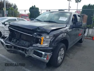 2020 Ford F-150 XL with VIN 1FTEW1C46LKD28184, listed as a IAAI auction lot 42071631 with 131,629 mi miles and . Bid and sale history available at DreamBid. Image 2.
