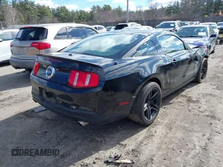 2010 Ford Mustang GT with VIN 1ZVBP8CH1A5140239, listed as a IAAI auction lot 41886862 with 65,117 mi miles. Bid and sale history available at carsss.com. Image 4.