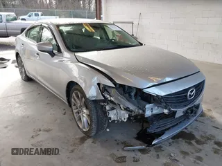 2017 Mazda Mazda6 Touring with VIN JM1GL1V50H1144637, listed as a IAAI auction lot 41849569 with 100,047 mi miles. Bid and sale history available at carsss.com. Image 1.