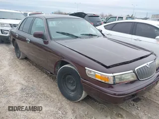 1997 Mercury Grand Marquis GS z VIN 2MELM74W6VX659538, wystawiony jako IAAI lot #41485768 z przebiegiem 265 972 mil mil oraz . Historia ofert i sprzedaży dostępna na DreamBid. Obrazek 1.