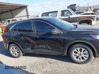 2023 Ford Escape Active with VIN 1FMCU0GNXPUA70431, listed as a IAAI auction lot 41822052 with 17,170 mi miles and . Bid and sale history available at DreamBid. Image 13.