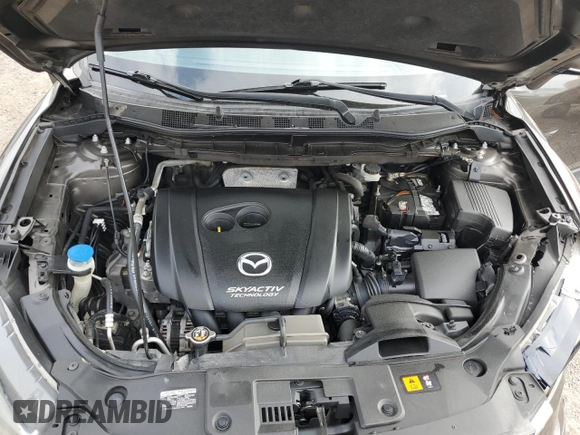 2016 Mazda CX-5 Grand Touring z VIN JM3KE2DY7G0735355, wystawiony jako Copart lot #49438285 z przebiegiem 132 731 mil mil oraz Szkoda całkowita • Salvage title. Historia ofert i sprzedaży dostępna na DreamBid. Obrazek 12.