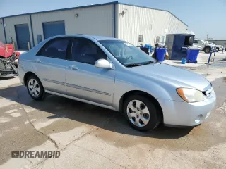 2006 Kia Spectra EX with VIN KNAFE121865277527, listed as a Copart auction lot 74613214 with 123,368 mi miles and Salvage Title. Bid and sale history available at carsss.com. Image 4.