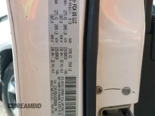 2019 Jeep Cherokee Limited with VIN 1C4PJMDX1KD293624, listed as a Copart auction lot 61102005 with 57,321 mi miles and Salvage title. Bid and sale history available at DreamBid. Image 14.
