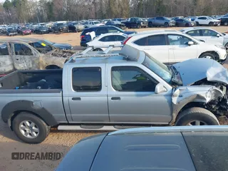 2003 Nissan Frontier SE z VIN 1N6ED29X23C450948, wystawiony jako IAAI lot #41902685 z przebiegiem 209 330 mil mil oraz . Historia ofert i sprzedaży dostępna na DreamBid. Obrazek 13.