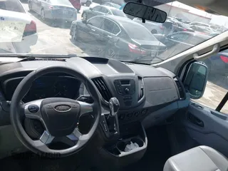 2015 Ford Transit Cargo with VIN 1FTNE2CMXFKA06516, listed as a IAAI auction lot 41650498 with 281,654 mi miles and . Bid and sale history available at carsss.com. Image 18.