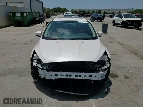 2015 Ford Focus Titanium с VIN 1FADP3J24FL304136, выставлен на аукционе Copart как лот 58428865 с пробегом 81 668 миль миль и Списание • Salvage title. История ставок и продаж доступна на DreamBid. Изображение 14.