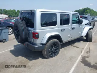 2024 Jeep Wrangler Sahara with VIN 1C4RJXP60RW292136, listed as a IAAI auction lot 42280063 with 26,701 mi miles and . Bid and sale history available at DreamBid. Image 4.