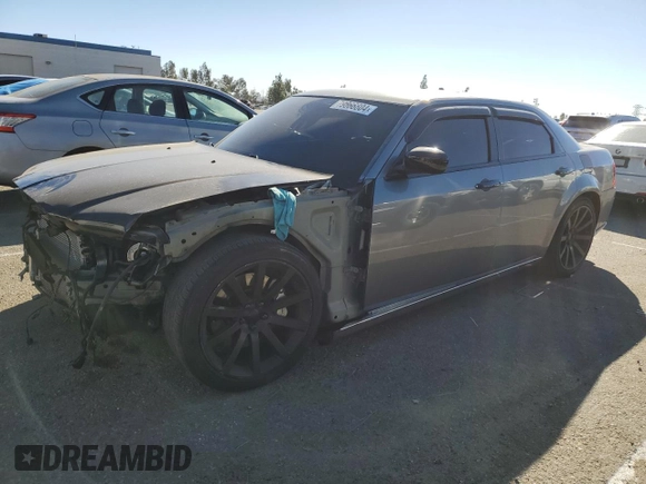 2006 Chrysler 300 C SRT8 with VIN 2C3KA73W06H228944, listed as a Copart auction lot 79866804 with 102,448 mi miles and Salvage Title. Bid and sale history available at carsss.com. Image 1.