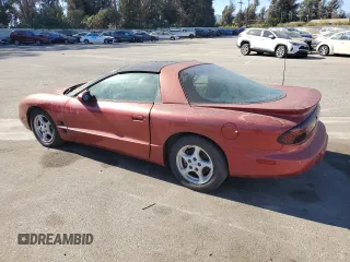 1998 Pontiac Firebird Firebird z VIN 2G2FS22K6W2202173, wystawiony jako Copart lot #77708594 z przebiegiem Nie podano mil oraz Czysty tytuł • Clean title. Historia ofert i sprzedaży dostępna na DreamBid. Obrazek 2.
