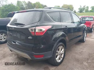 2017 Ford Escape SE with VIN 1FMCU9GD6HUB90367, listed as a IAAI auction lot 42088930 with 145,286 mi miles and . Bid and sale history available at DreamBid. Image 4.