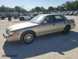 2000 Ford Crown Victoria with VIN 2FAFP73W4YX216080, listed as a Copart auction lot 53774835 with 144,404 mi miles and Salvage Title. Bid and sale history available at carsss.com. Image 1.