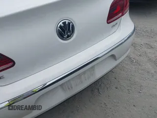 2014 Volkswagen CC R-Line with VIN WVWBP7AN7EE534565, listed as a IAAI auction lot 42477774 with 85,539 mi miles and . Bid and sale history available at DreamBid. Image 6.