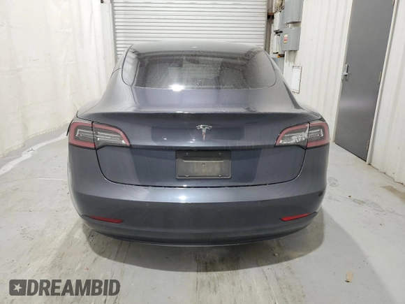 2022 Tesla Model 3 with VIN 5YJ3E1EA7NF289487, listed as a Copart auction lot 55527845 with 151,403 mi miles and Clean Title. Bid and sale history available at DreamBid. Image 6.