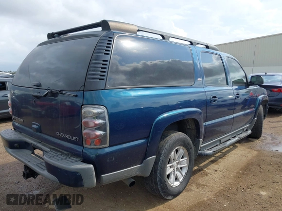2005 Chevrolet Suburban Z71 with VIN 3GNFK16Z05G242037, listed as a IAAI auction lot 40719140 with 164,409 mi miles. Bid and sale history available at carsss.com. Image 4.