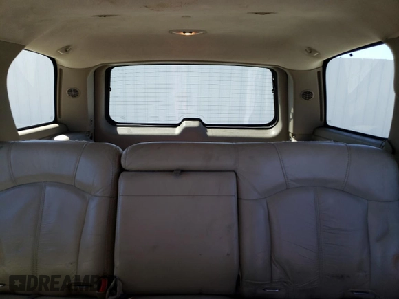 2002 Chevrolet Tahoe LT z VIN 1GNEK13T42R152851, wystawiony jako Copart lot #67958403 z przebiegiem 257 989 mil mil oraz Szkoda całkowita • Salvage title. Historia ofert i sprzedaży dostępna na DreamBid. Obrazek 10.