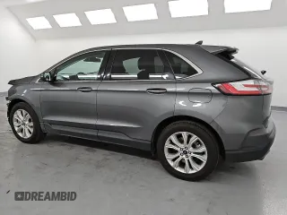 2022 Ford Edge Titanium with VIN 2FMPK4K91NBA31156, listed as a Copart auction lot 52986225 with 81,608 mi miles and Clean Title. Bid and sale history available at carsss.com. Image 2.