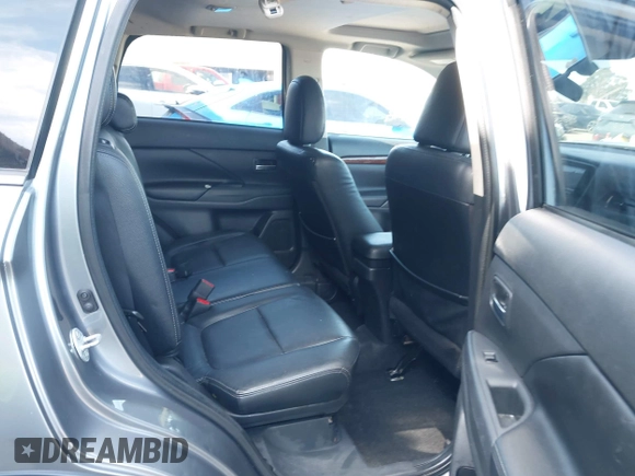 2015 Mitsubishi Outlander GT with VIN JA4JZ4AX1FZ005879, listed as a IAAI auction lot 41701299 with 212,805 mi miles and . Bid and sale history available at DreamBid. Image 8.