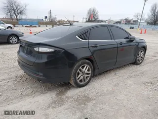 2015 Ford Fusion SE with VIN 1FA6P0H78F5121755, listed as a IAAI auction lot 41557675 with 128,511 mi miles. Bid and sale history available at carsss.com. Image 4.