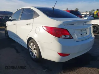 2016 Hyundai Accent SE z VIN KMHCT4AE0GU062891, wystawiony jako IAAI lot #40989721 z przebiegiem 128 457 mil mil oraz . Historia ofert i sprzedaży dostępna na DreamBid. Obrazek 3.