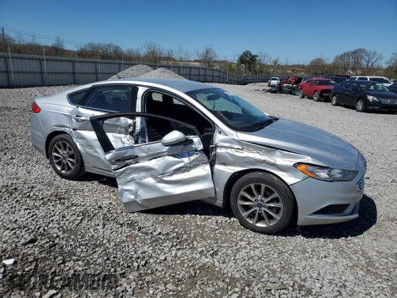 2017 Ford Fusion SE с VIN 3FA6P0H75HR370935, выставлен на аукционе Copart как лот 50082105 с пробегом 209 960 миль миль и Списание • Salvage title. История ставок и продаж доступна на DreamBid. Изображение 4.