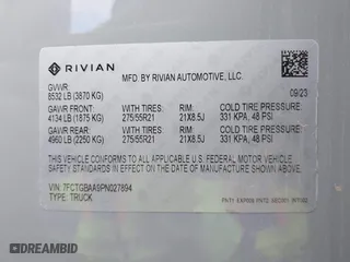 2023 Rivian R1T Adventure with VIN 7FCTGBAA9PN027894, listed as a IAAI auction lot 42061339 with 5,047 mi miles. Bid and sale history available at carsss.com. Image 9.