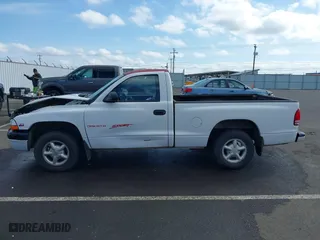 1999 Dodge Dakota SLT with VIN 1B7FL26X9XS109444, listed as a IAAI auction lot 41753871 with 254,190 mi miles. Bid and sale history available at carsss.com. Image 14.