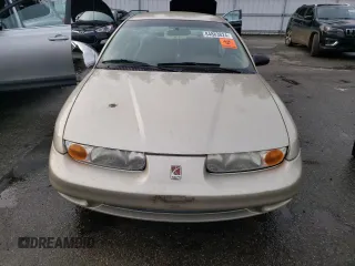 2001 Saturn SL z VIN 1G8ZH52851Z286886, wystawiony jako Copart lot #84883824 z przebiegiem Nie podano mil oraz Szkoda całkowita • Salvage title. Historia ofert i sprzedaży dostępna na DreamBid. Obrazek 5.