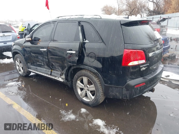 2012 Kia Sorento EX with VIN 5XYKUDA2XCG301636, listed as a IAAI auction lot 41619793 with 220,692 mi miles. Bid and sale history available at carsss.com. Image 3.